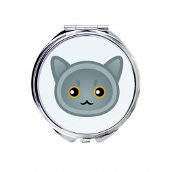 Uno specchio tascabile con un gatto del British Shorthair. Una nuova collezione con il simpatico gatto Art-Dog