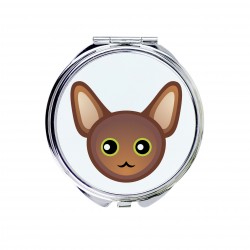 Uno specchio tascabile con un gatto del Oriental gatto. Una nuova collezione con il simpatico gatto Art-Dog