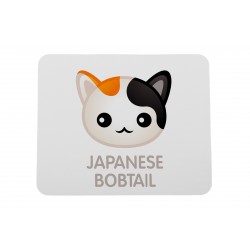 Una almohadilla de mouse de computadora con un gato de Bobtail japonés. Una nueva colección con el lindo gato Art-dog