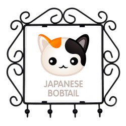 Un portachiavi con il Bobtail giapponese. Una nuova collezione con il simpatico gatto Art-dog