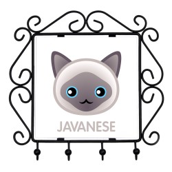 Un estante clave con Javanese cat. Una nueva colección con el lindo gato Art-dog