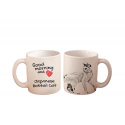 Kot japoński bobtail - kubek z wizerunkiem kota i napisem "Good morning and love...". Wysokiej jakości kubek ceramiczny.